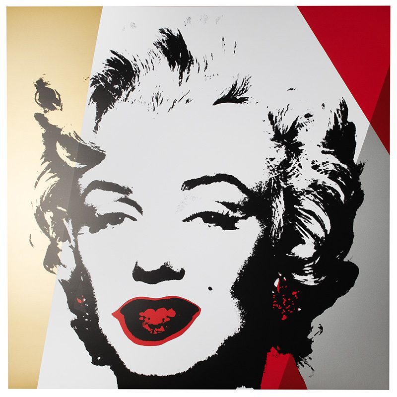 Andy Warhols iconic silkscreen print of Marilyn Monroe, this version is in the colourway of silver, gold, black, red, and grey.