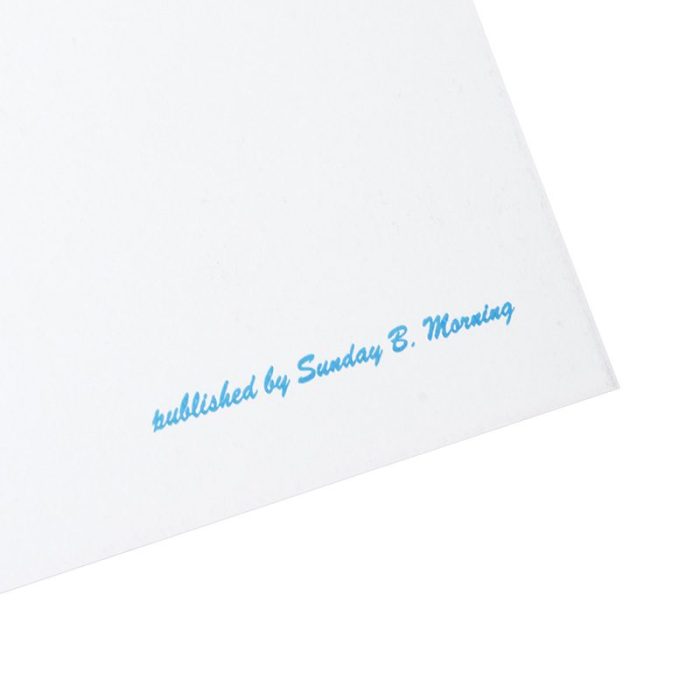 A 'Published by Sunday B Morning' stamp signature in blue. the stamp is located on the right bottom back of the Marilyn Monroe print